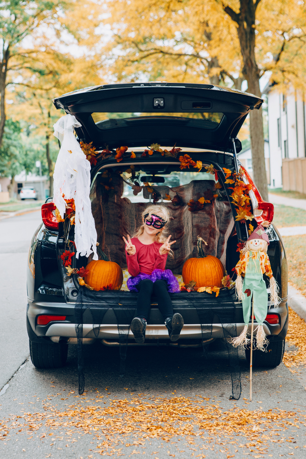 Child Having a Trunk or Treat on Halloween